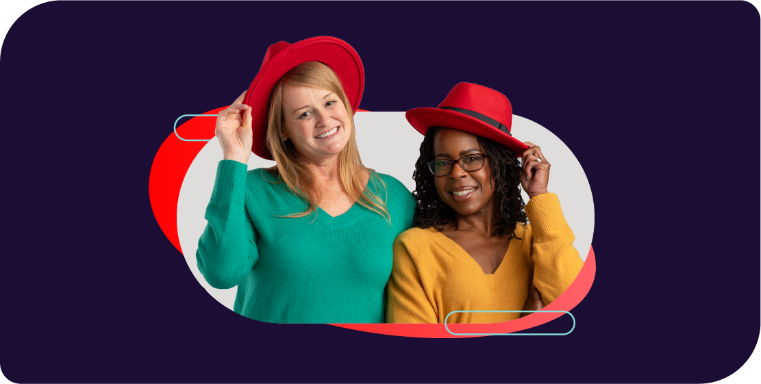 Two Red Hatters wearing their fedoras.
