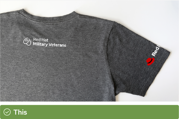 The back of a t-shirt, showing the Red Hat Military Veterans logo. 