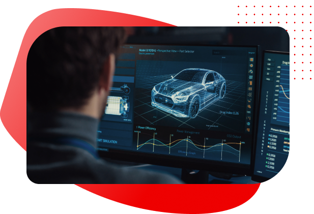自動車のブループリントが表示されたコンピュータ画面を見ている男性